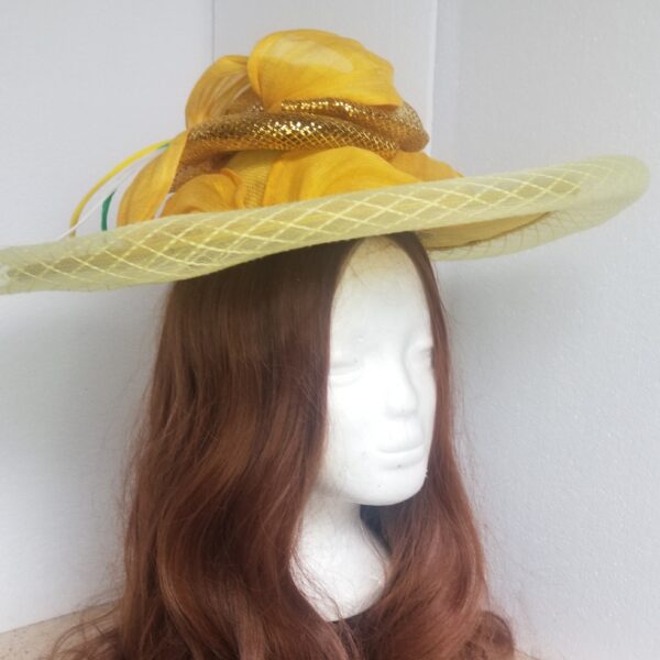 large yellow brimmed hat close up