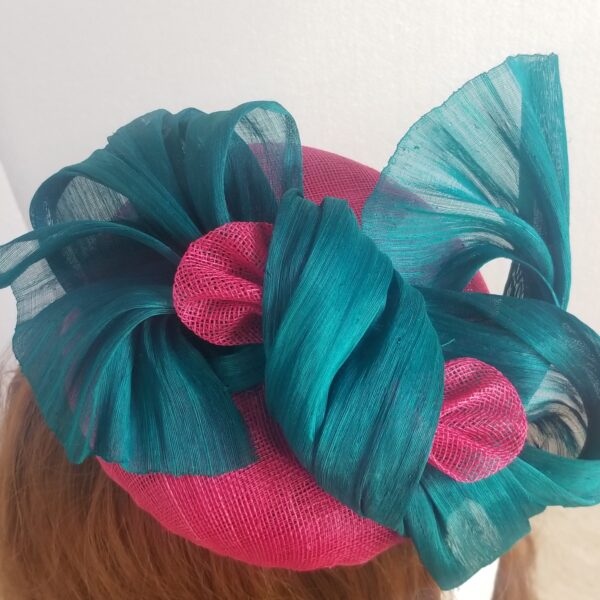 pink and aqua button hat top view