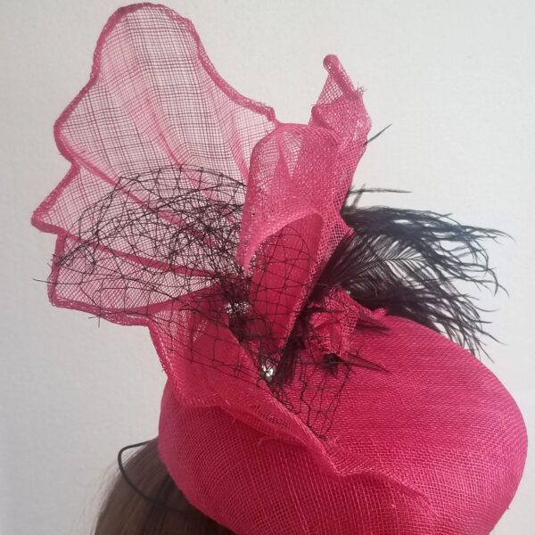 pink and black fan hat side view