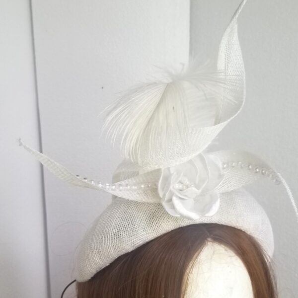 white headband feathers close up