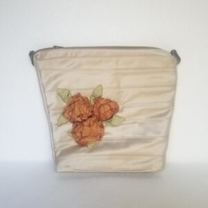 beige and tan clutch bag
