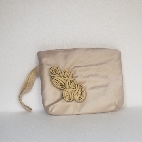 small beige clutch bag with roses and hand loop