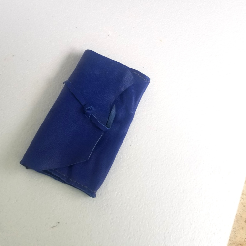 blue leather pochette