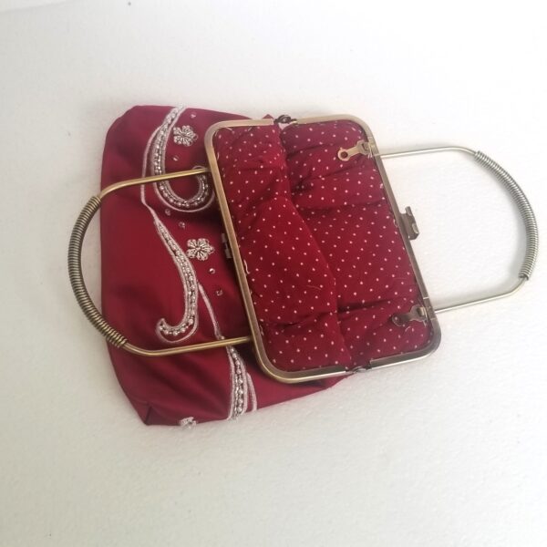 red bag with metal handles interior