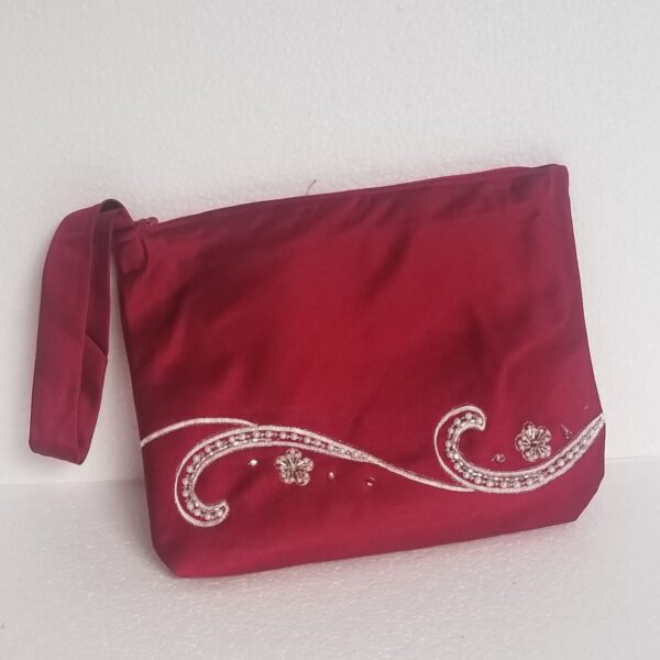 small zipped red handbag