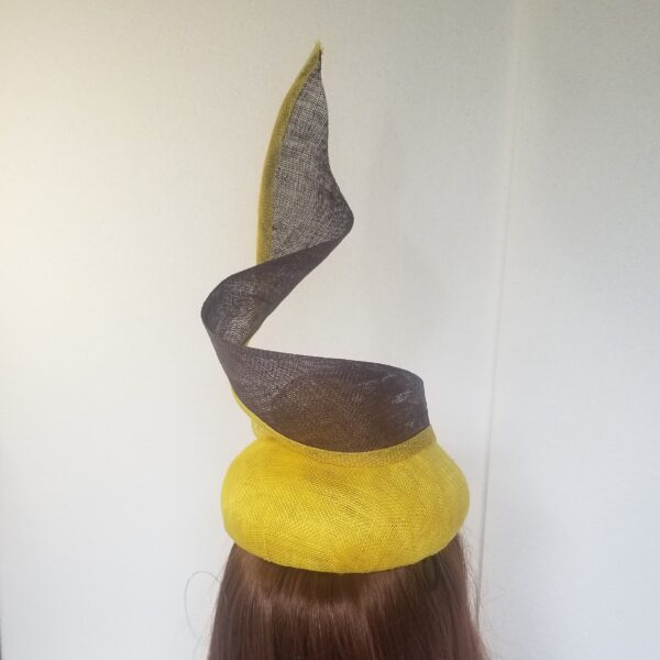 yellow and brown spiral hat