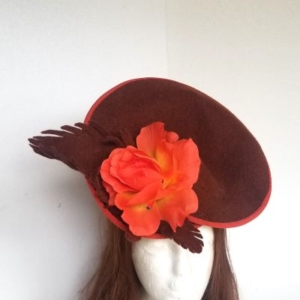 Brown felt hatinator with orange rose