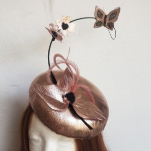 Metallic pink leather button hat