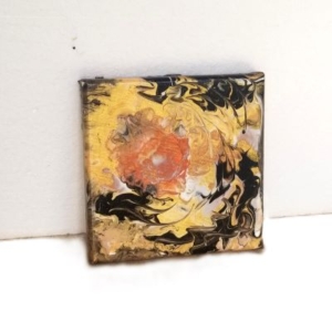 black and gold metallic acrylic pour